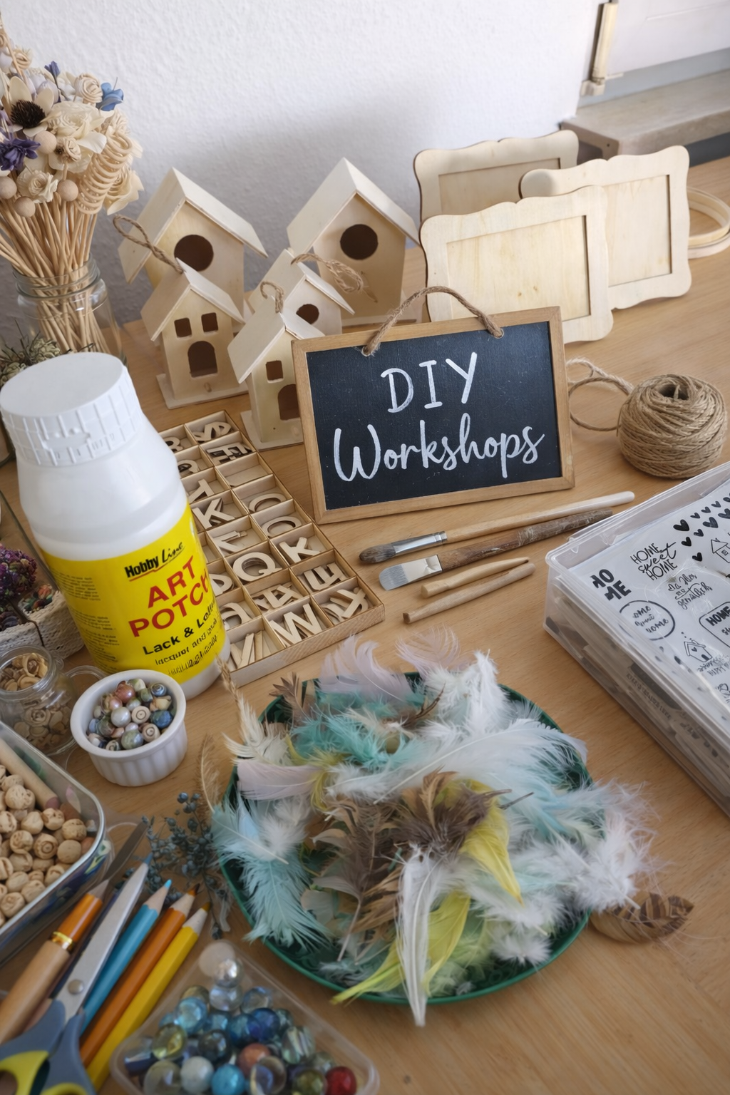 DIY workshop materials on wooden table.