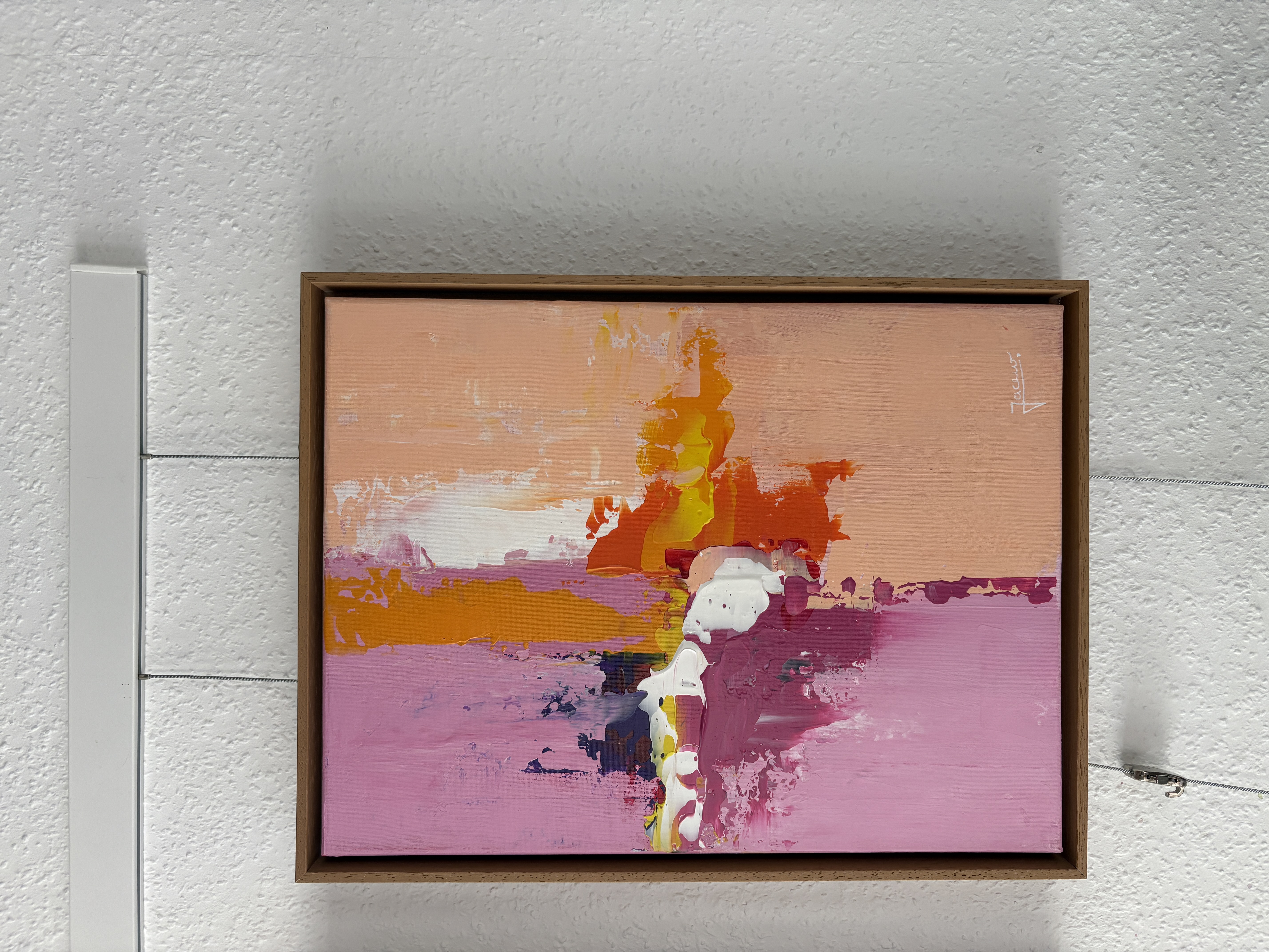 Abstract painting with vibrant colors on canvas.