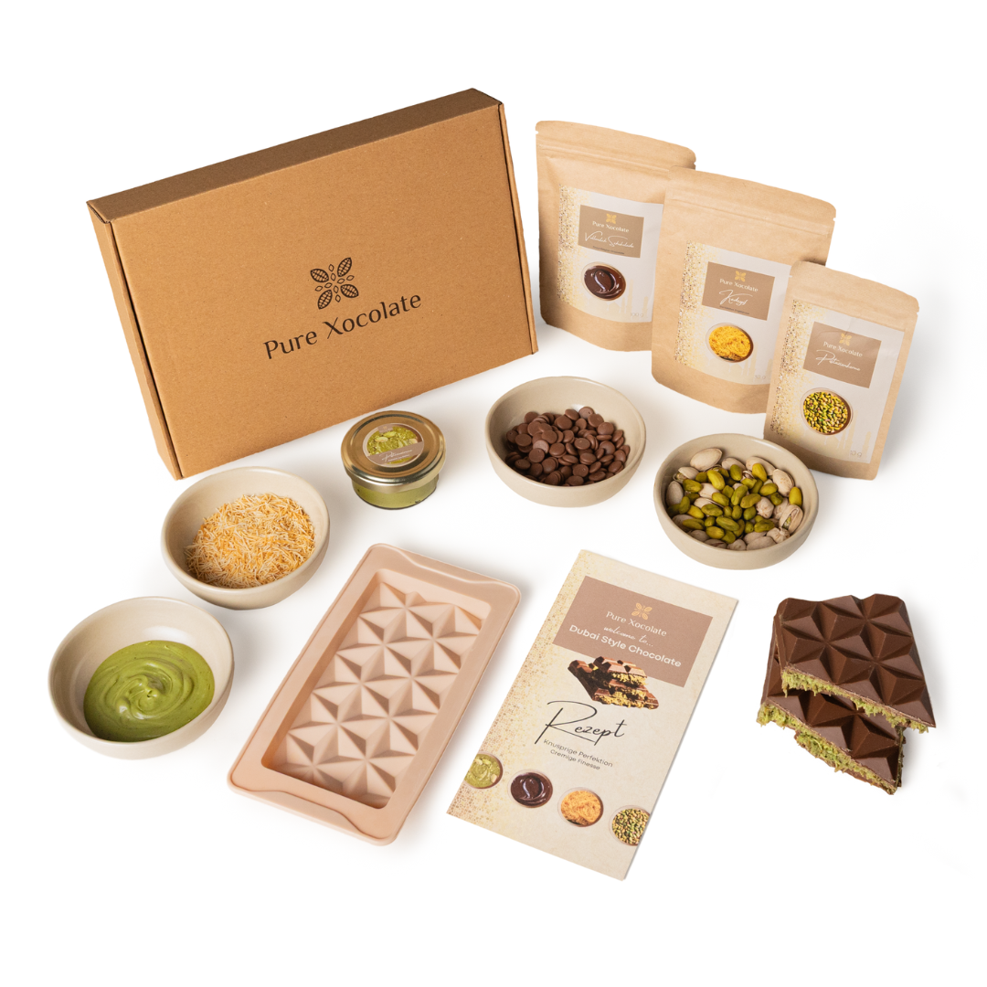 Chocolate making kit with various ingredients.