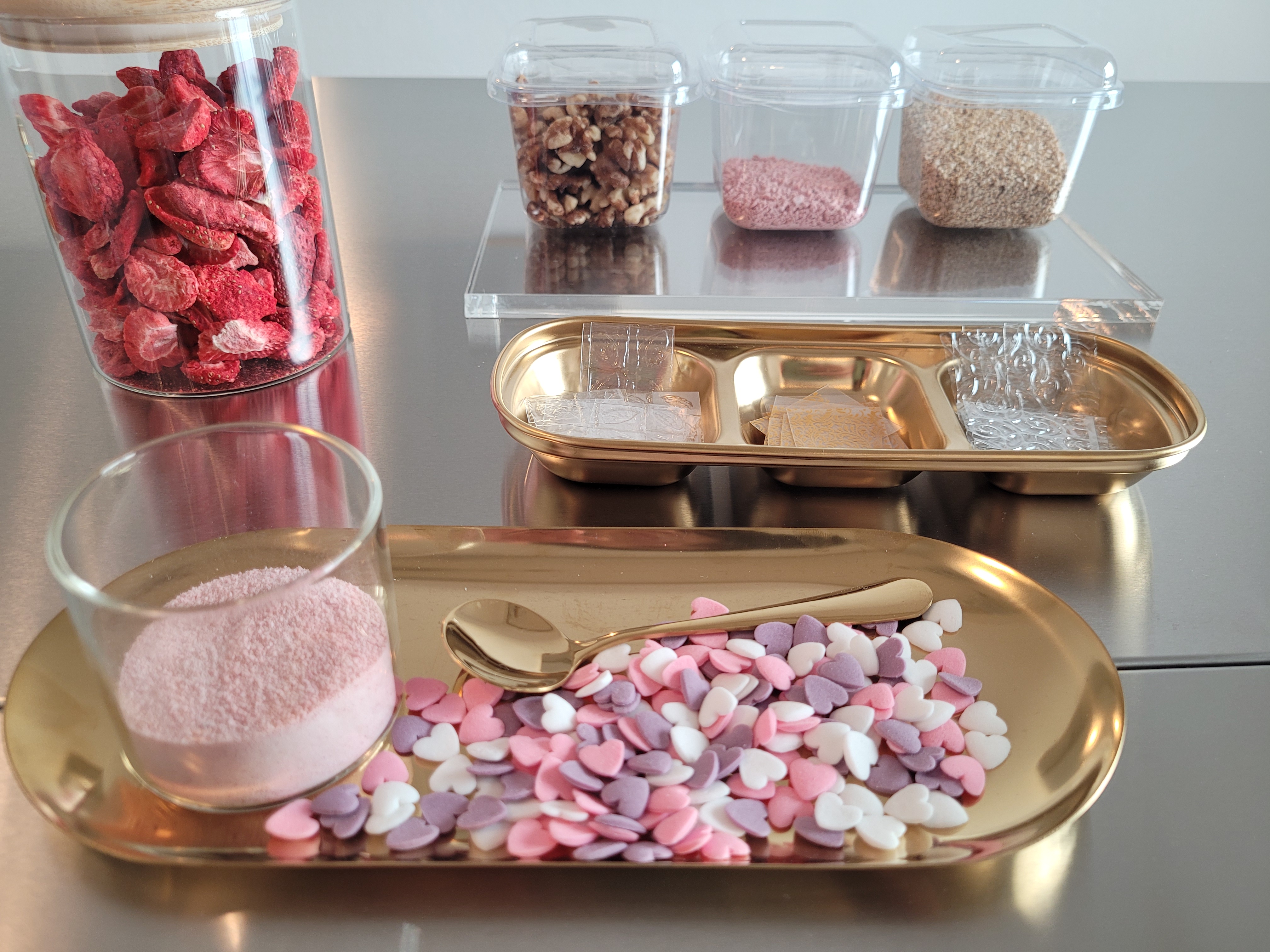 Assorted kitchen ingredients on a metal surface.