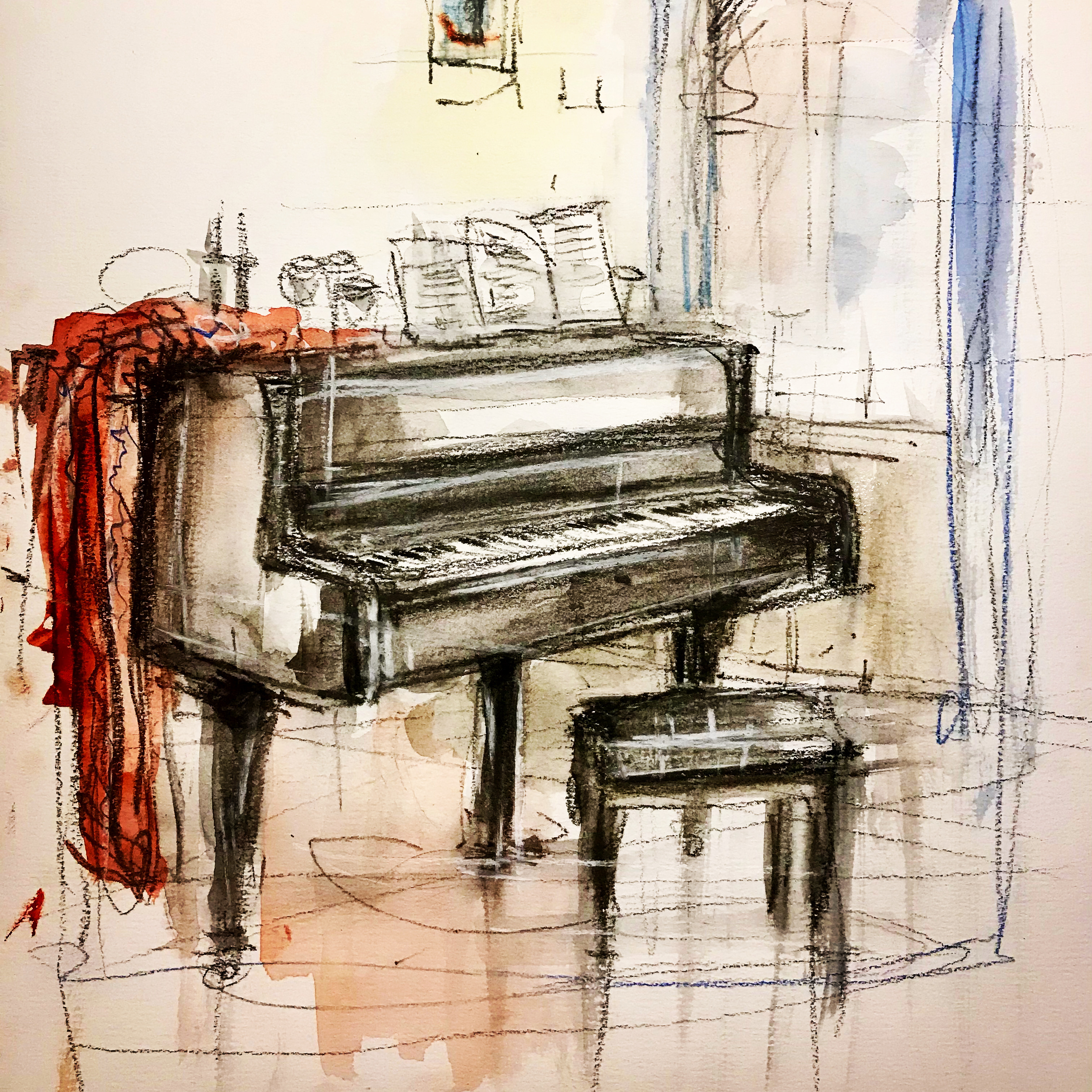 Play black and white piano surrounded by a cozy room.