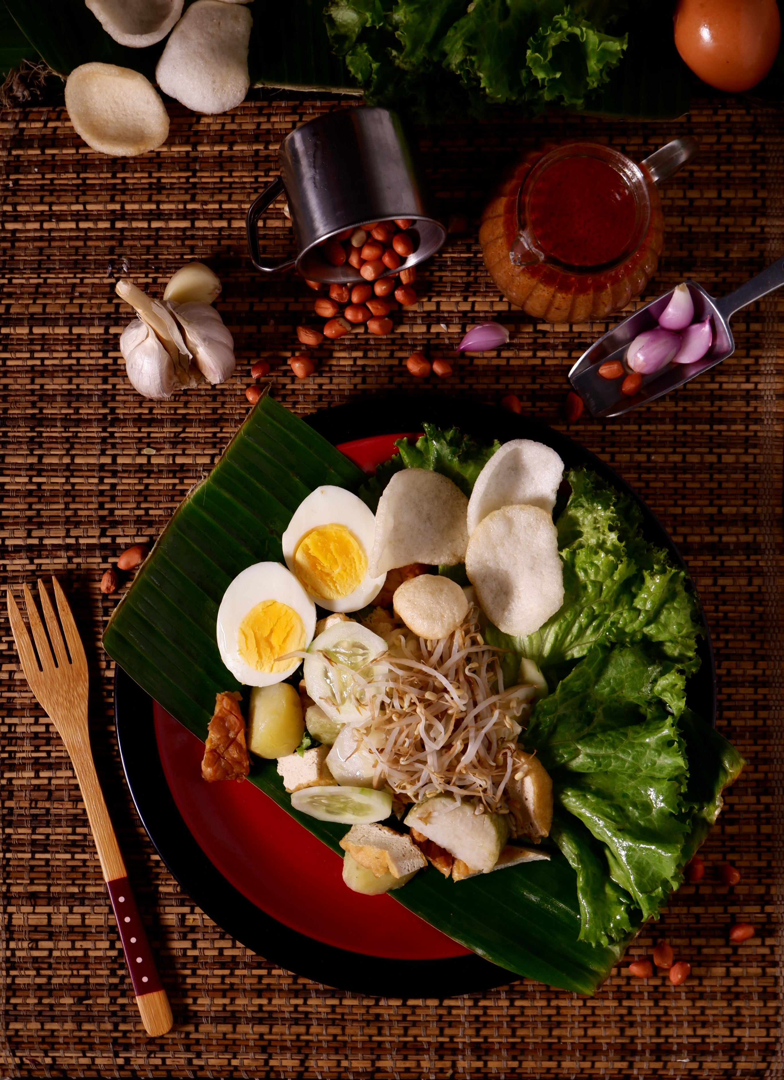 A plate with various fields of vegetables and eggs.