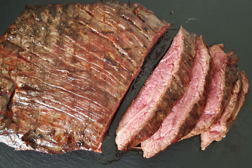 Grilled meat is placed separately on a bulletin board.
