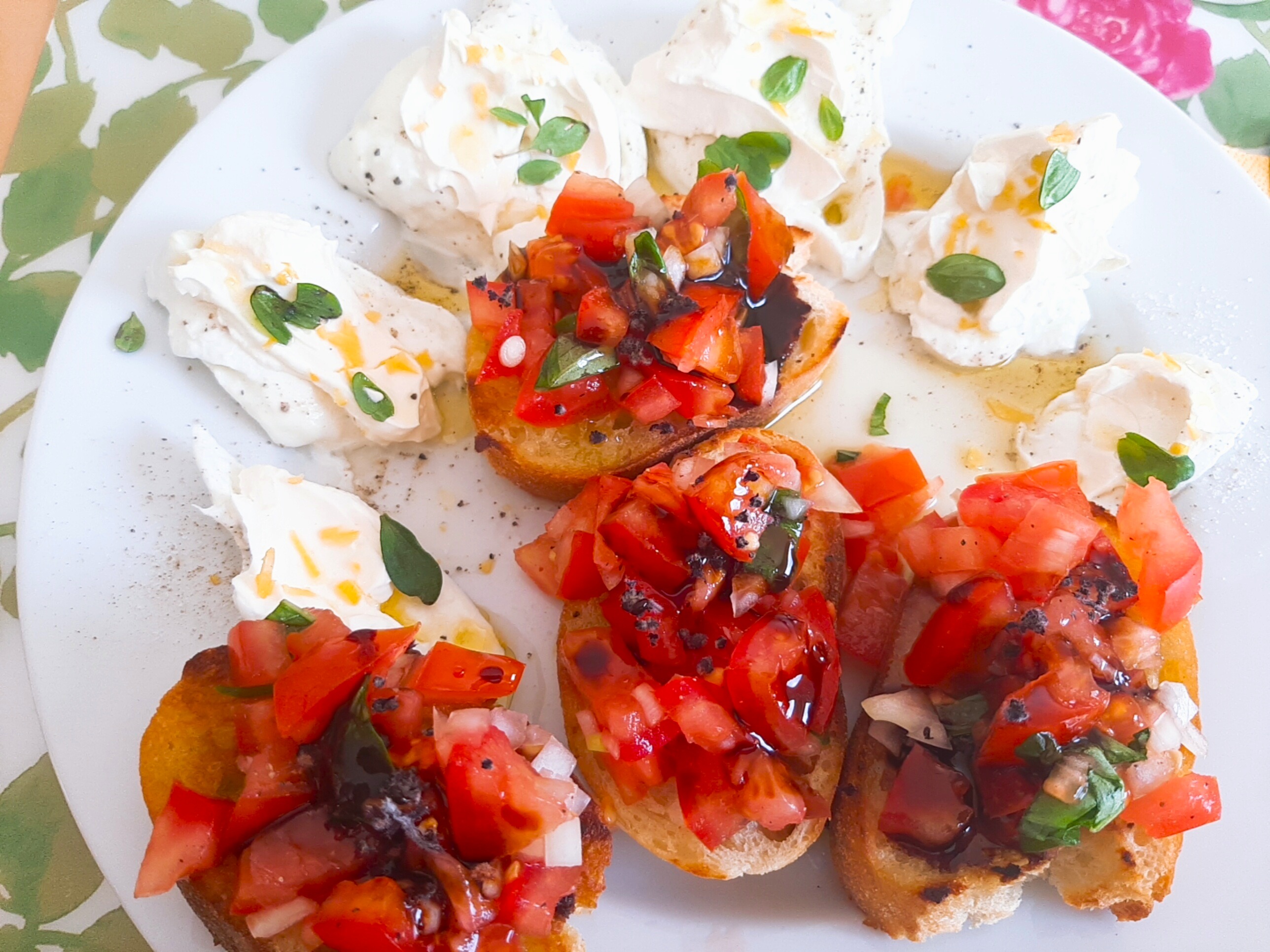 Toasted bread with tomato salsa and fresh cheese.