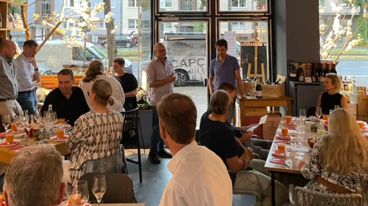 People dining and socializing in a restaurant.